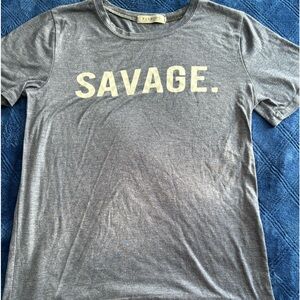 Juniors size S gray shortsleeved tee with “SAVAGE” written in white on the chest